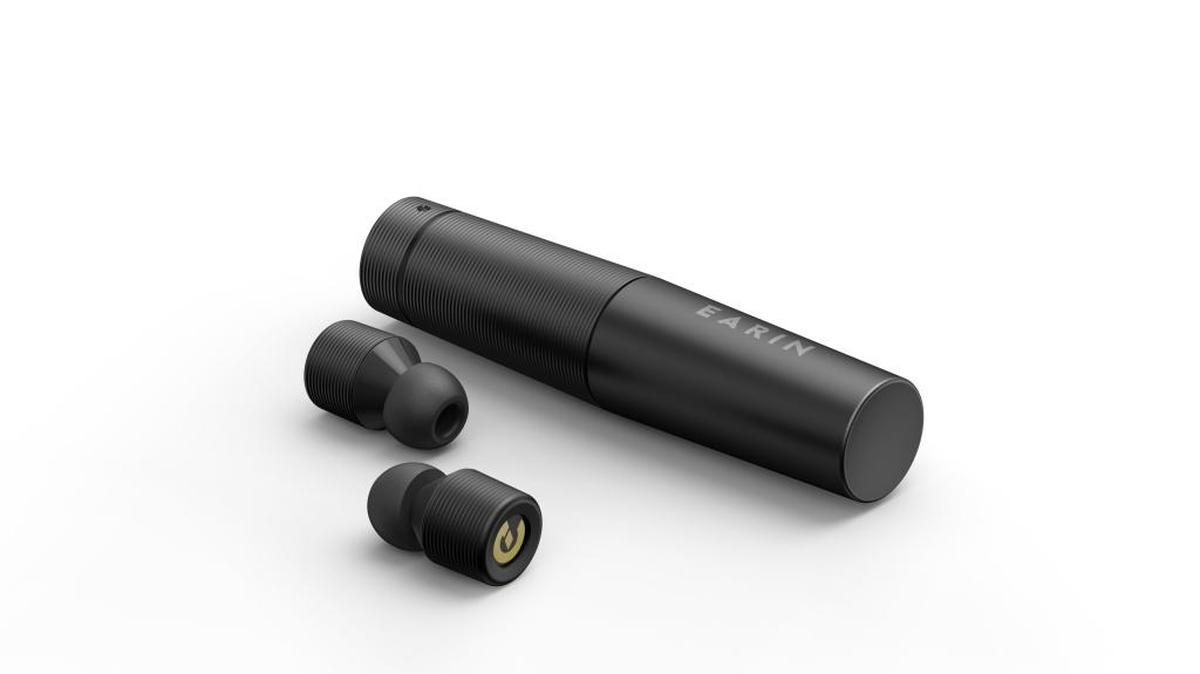Earin’s M-1 wireless earbuds charge in a lipstick-like capsule, which connects to a power source with a micro USB cable.