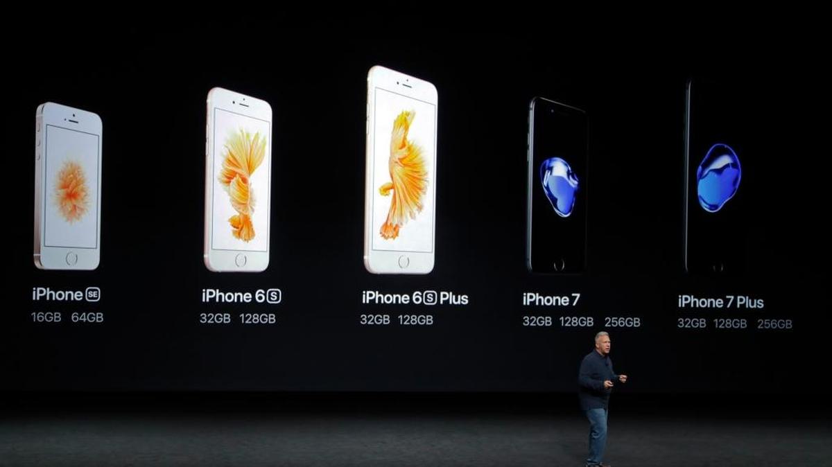 Apple senior vice president of worldwide marketing Phil Schiller talks about the iPhone lineup during Wednesday’s event to announce the company’s new products.