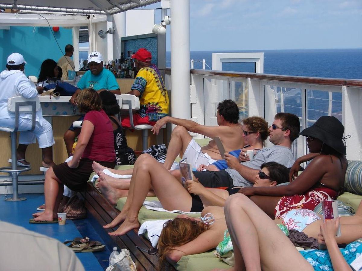 In this Miami Herald file photo, passengers sunning poolside on the Grand Celebration in 2009.