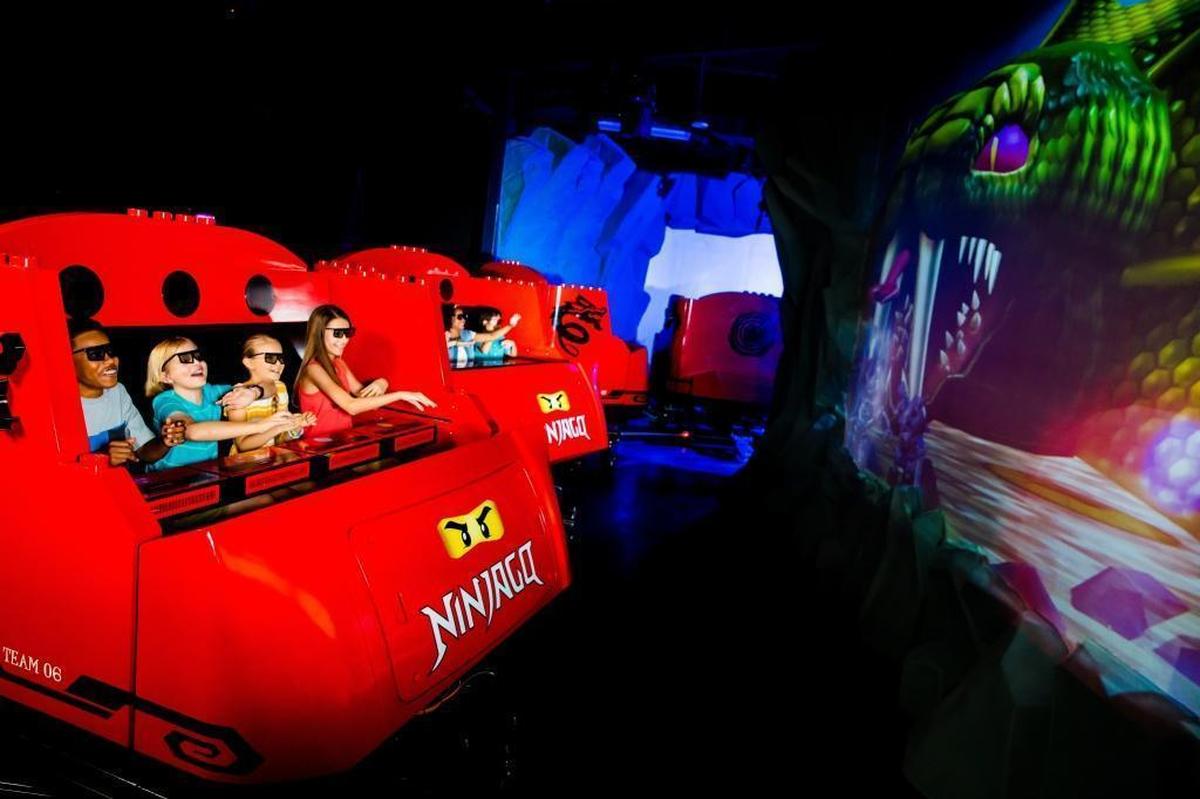 On Legoland’s Ninjaga ride, guests can launch fireballs and iceballs just by waving their hands. The ride some of the newest technology for theme park attractions.