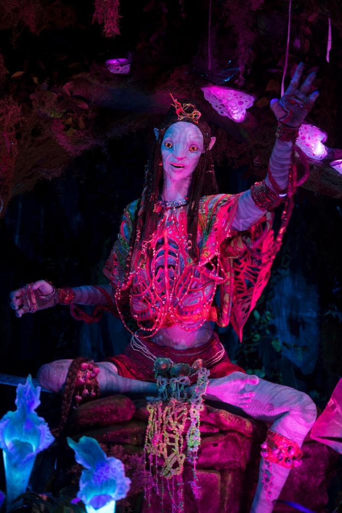 The Na’vi River Journey, in the World of Avatar at Disney’s Animal Kingdom, culminates in an encounter with a audio-animatronic Na’vi shaman.