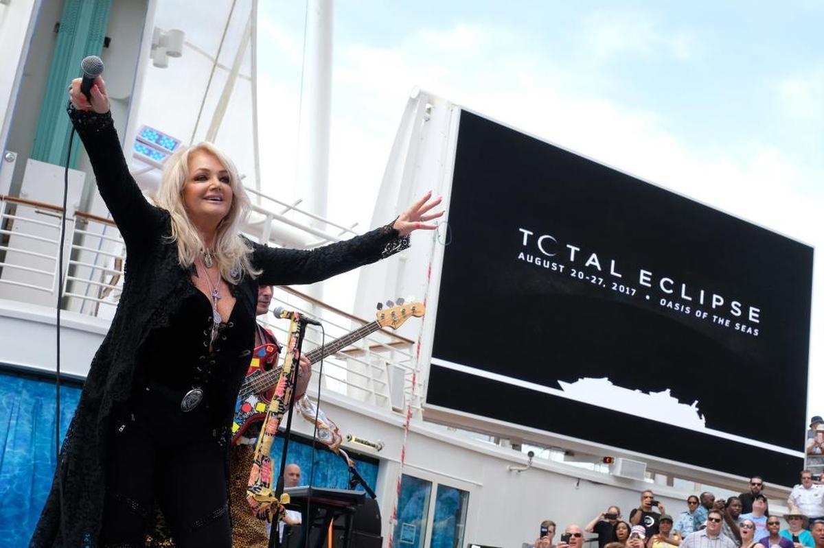Bonnie Tyler performs “Total Eclipse of the Heart” with pop band DNCE aboard Royal Caribbean International’s Oasis of the Seas on Monday during the solar eclipse.