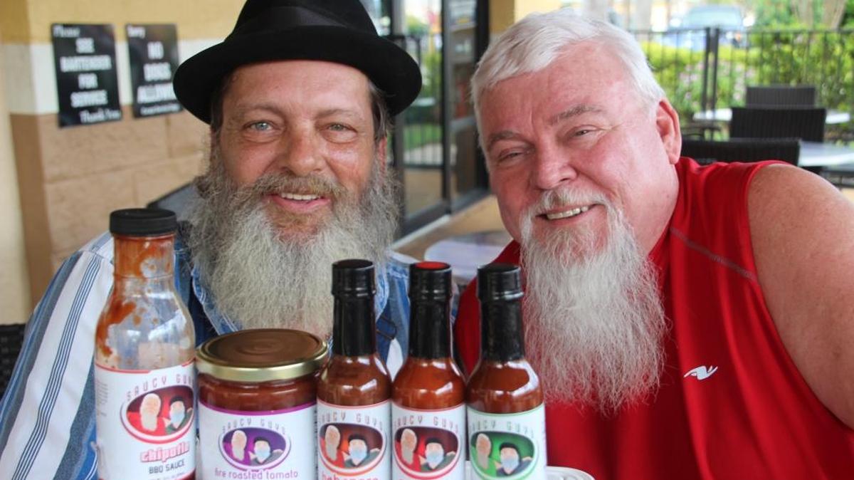 Jim Brannon, left, and Neil Currie of Bradenton are the creators of Saucy Guys hot sauce.