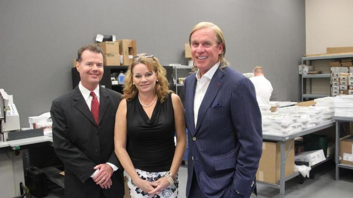 Director of operations Jum Studebaker, left, marketing director Julie Escobar, and ProspectsPLUS! founder Jim Morton are shown in the company’s printing plant at Lakewood Ranch.