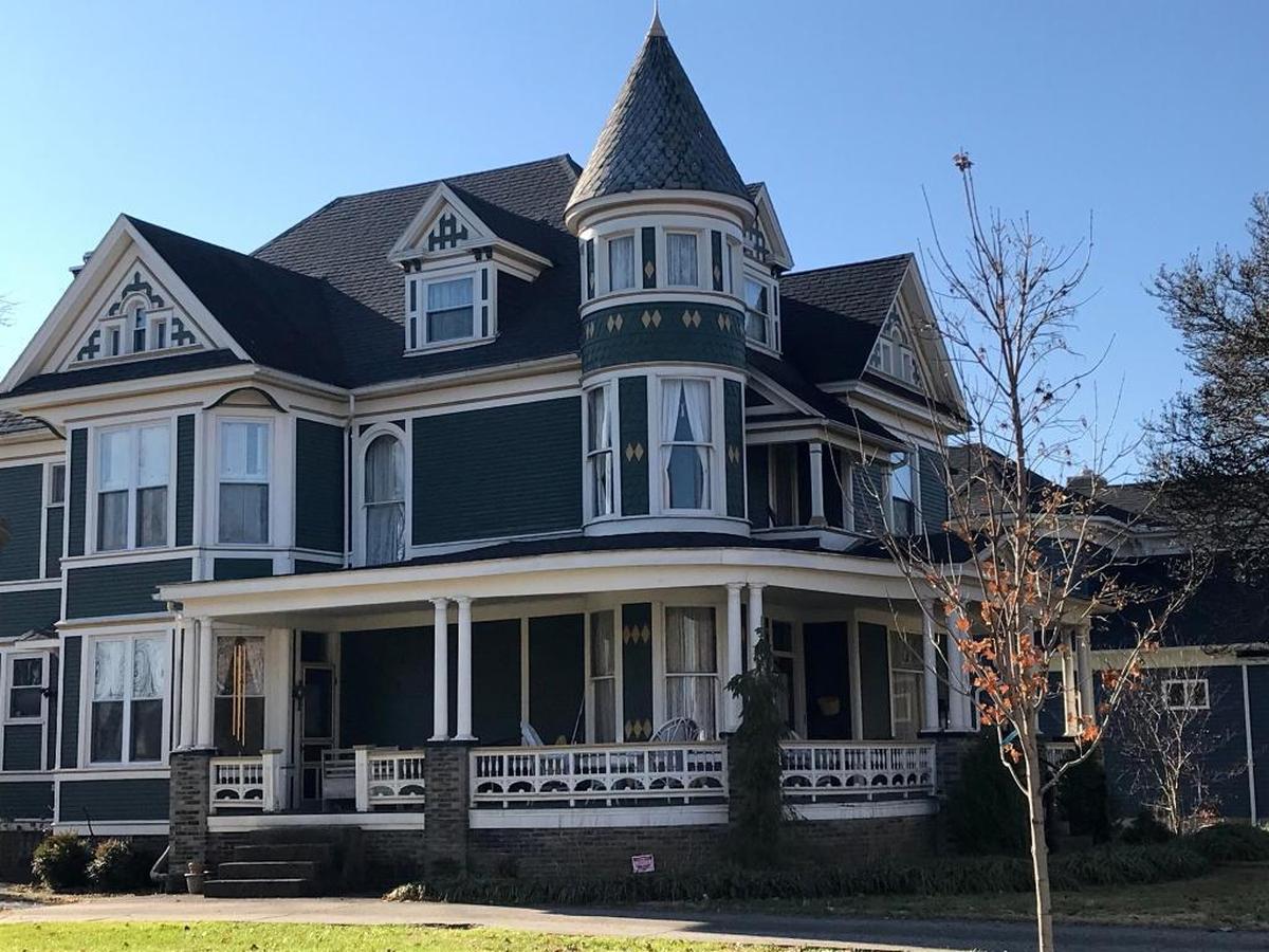 Well-kept historic homes stand near Jackson’s downtown. They date to a time when pig-iron foundries and other heavy industry were major employers.