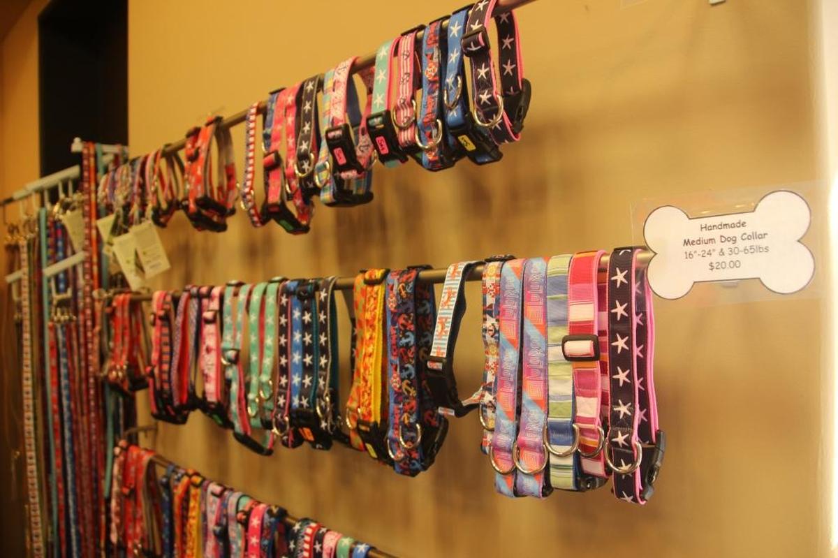 A variety of dog collars are popular sellers at the ruff life store at 417 12th St. W., Bradenton. The business opened on Old Main Street in October.