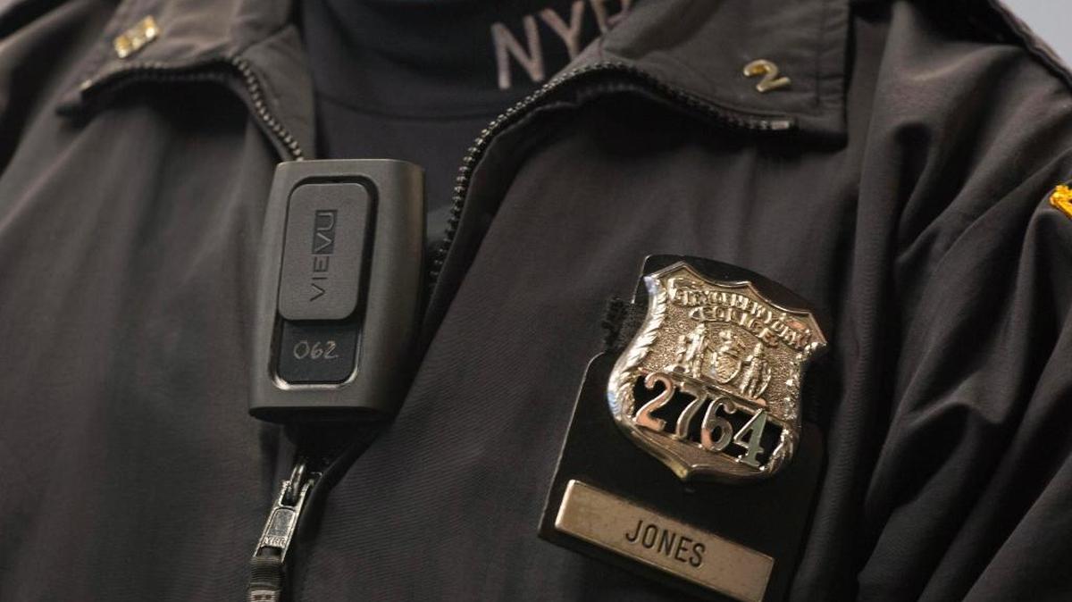In this 2014 photo, a NYPD officer wears a body camera on his chest. A bill in the Florida Legislature would allow officers to review body-camera footage in officer-involved shootings before making an official statement.