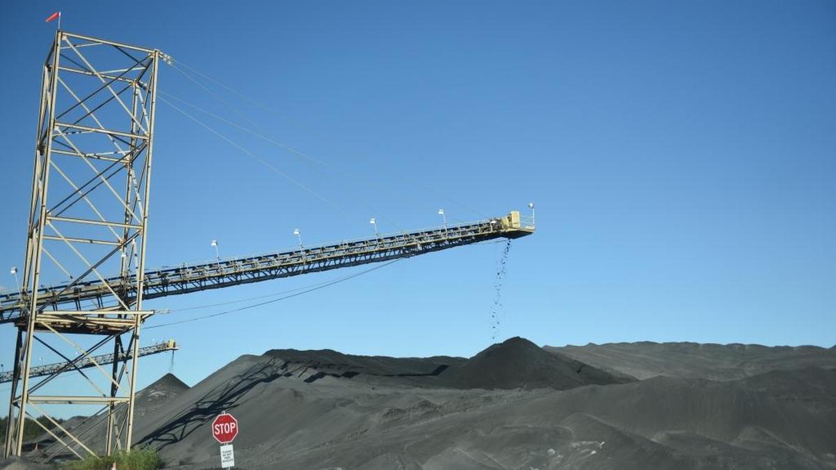 Phosphate rock spills into a pile at Mosaic’s Wingate facility on Jan. 9.