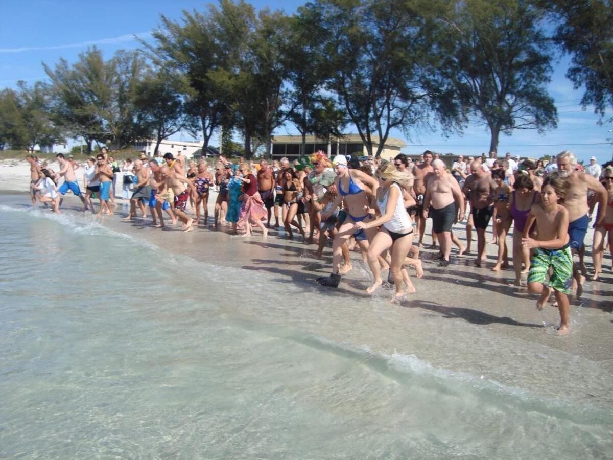 The Shamrock Shiver Charity Plunge is an annual event where people jump into the Gulf of Mexico around noon on New Year’s Day in return for donations to charity.