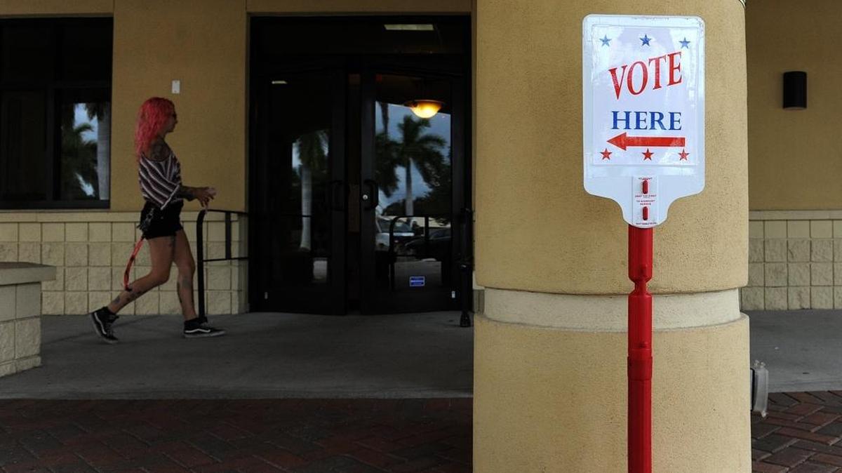 A voter casts her ballot at Renaissance on 9th Tuesday in Bradenton for the Florida primary.