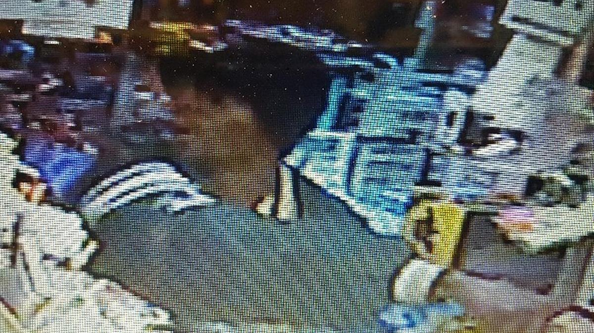 Police say this man robbed The Little Country Store at knife-point Thursday. They are seeking to identify him.