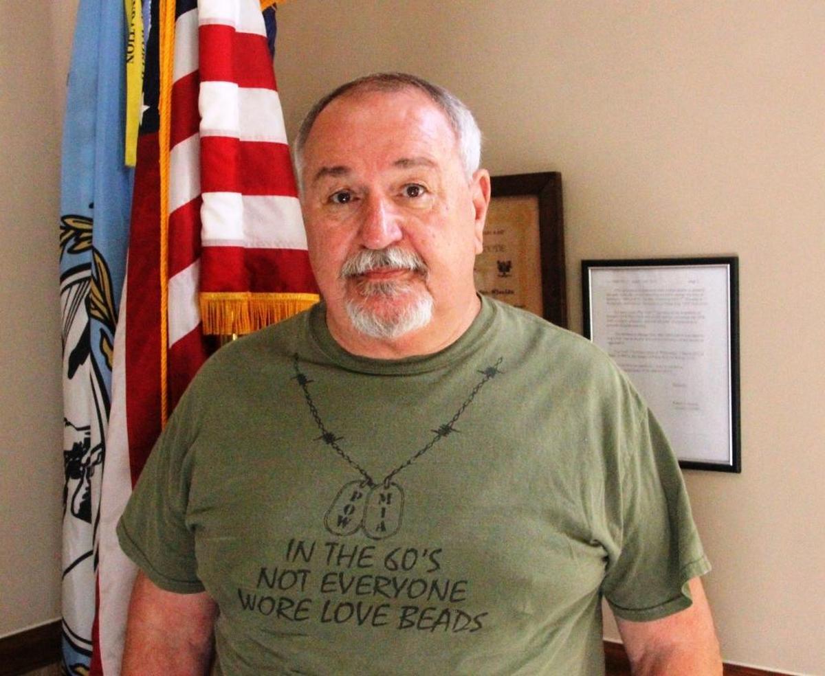 Tony Fouse’s T-shirt reads “In the 60’s not everybody wore love beads.” He is a Vietnam War veteran and a member of the Palma Sola Veterans of Foreign Wars Post.