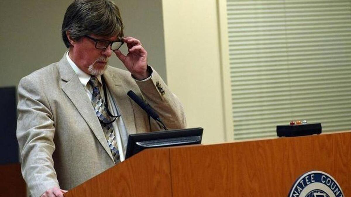 Manatee County planner Fred Goodrich addresses the Manatee County Commission during the first required public hearing on enacting a medical marijuana moratorium during a meeting earlier this month.