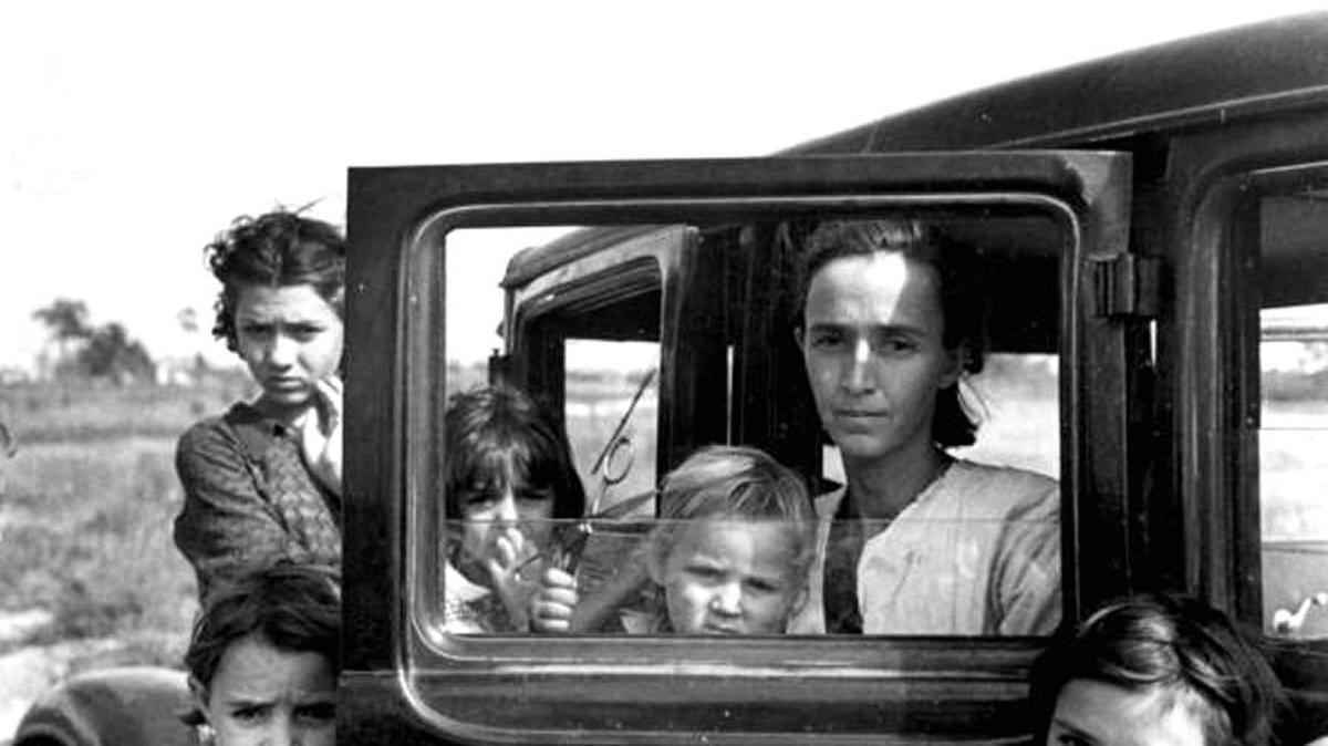 A family of migrant fruit pickers from Tennessee is shown in Winter Haven in 1937.