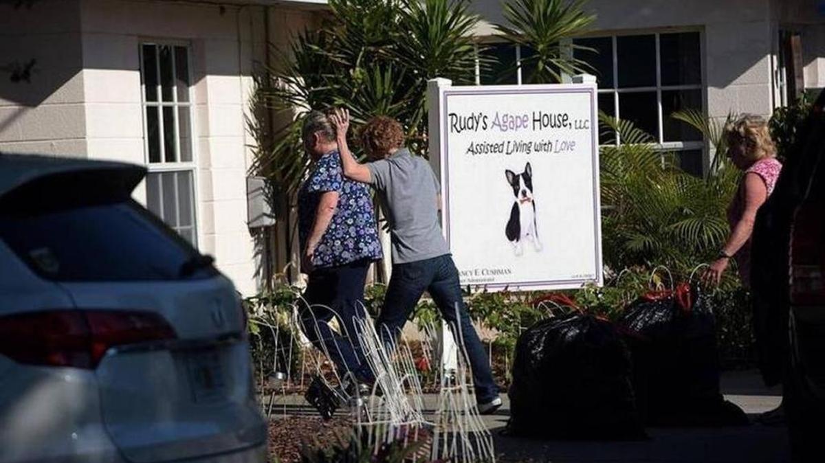 Workers at the former assisted living facility, whose owner evicted 15 elderly residents with just three days notice, scramble to avoid talking with the Bradenton Herald in March. The facility’s operator recently settled a $7,500 fine with the state but continues to operate a new facility.