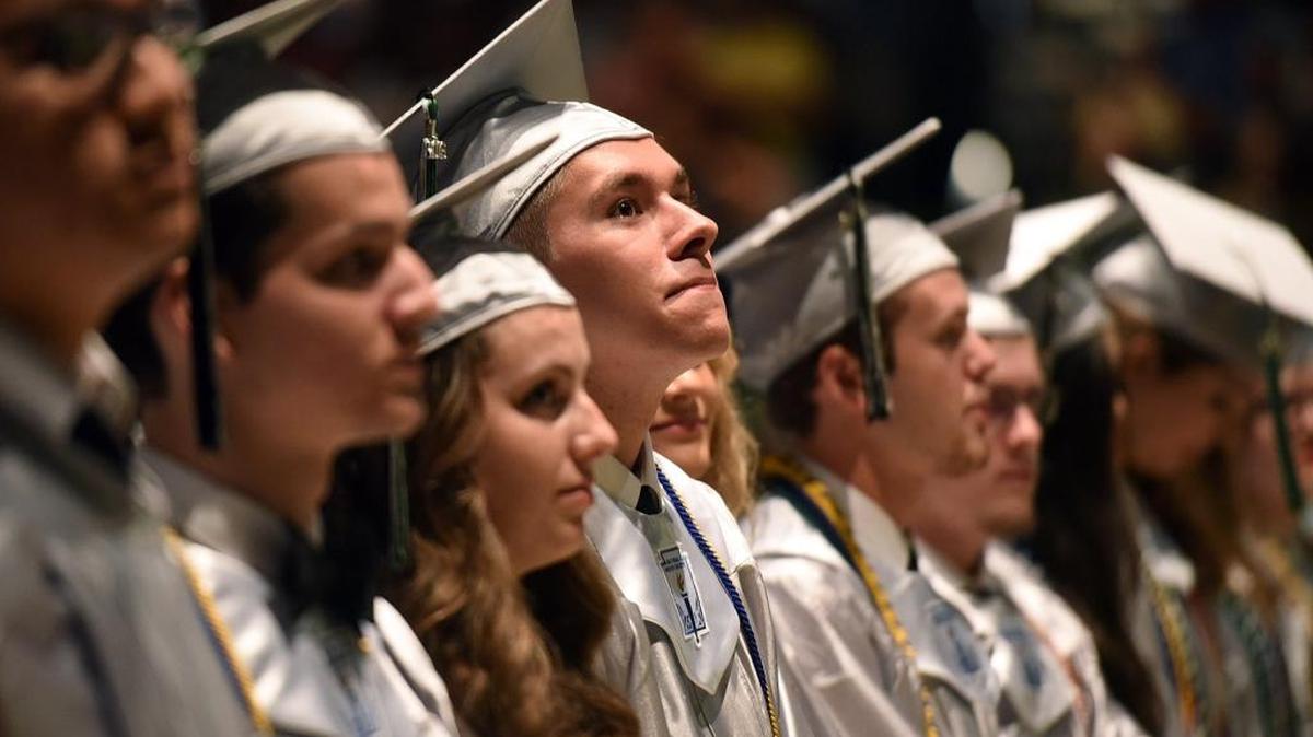 Grads watch a commemorative video at the Lakewood Ranch High School graduation held at the Bradenton Area Convention Center in Palmetto Wednesday night.
