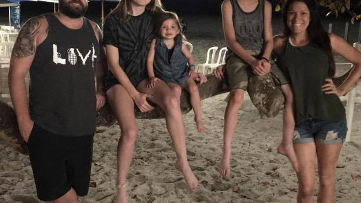 Hannah Ahlers, 34, with her husband Brian and there three children Briannah, Brice and Hailey, now 14, 11 and 3, during a visit to Anna Maria Island.
