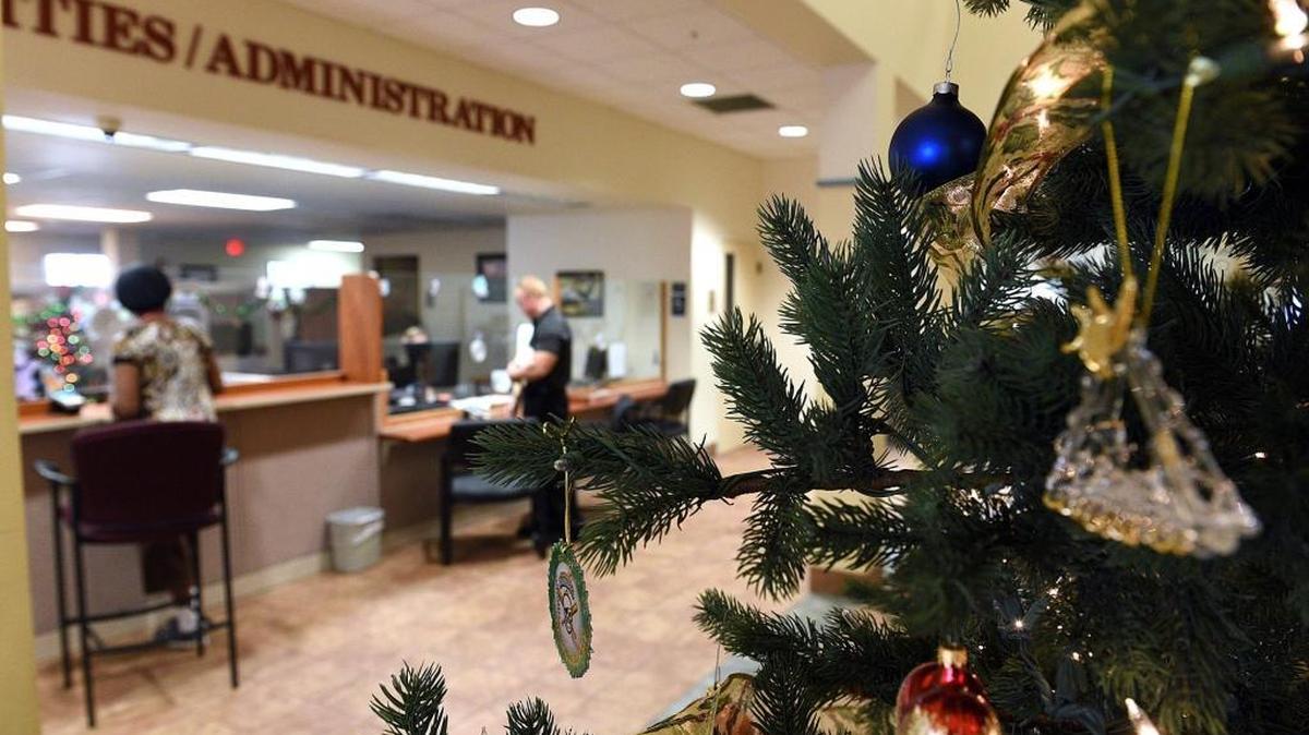 Customers pay their utilities at Bradenton City Hall where a frustrated city council wants to improve the flow of communication and customer service standards to the public.