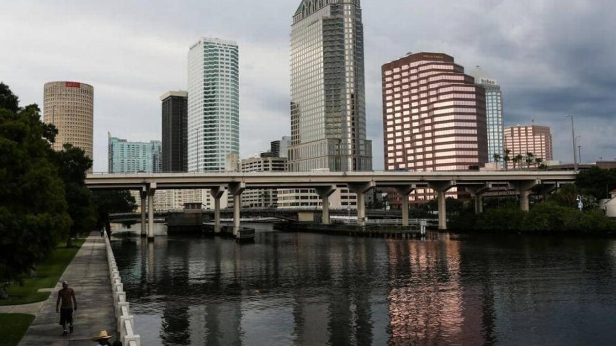 Storm clouds roll in over downtown Tampa in July.
