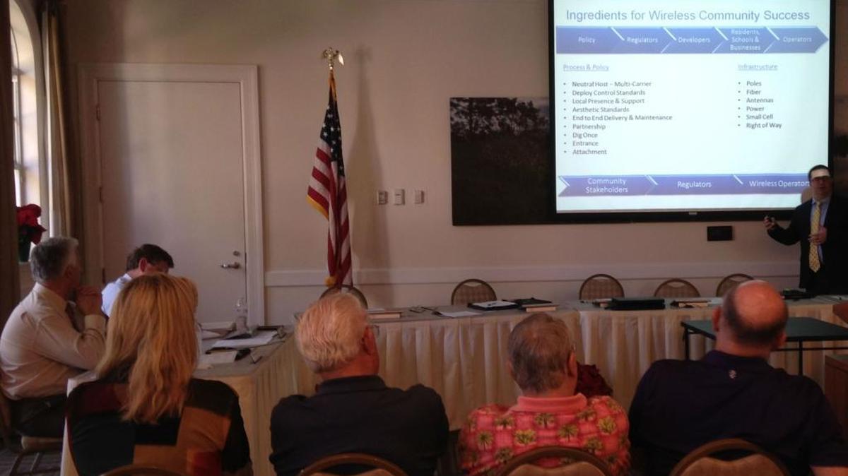 Lakewood Ranch District 1 supervisors take a seat in the audience to learn about a small cells proposal from USA Groups on Tuesday.