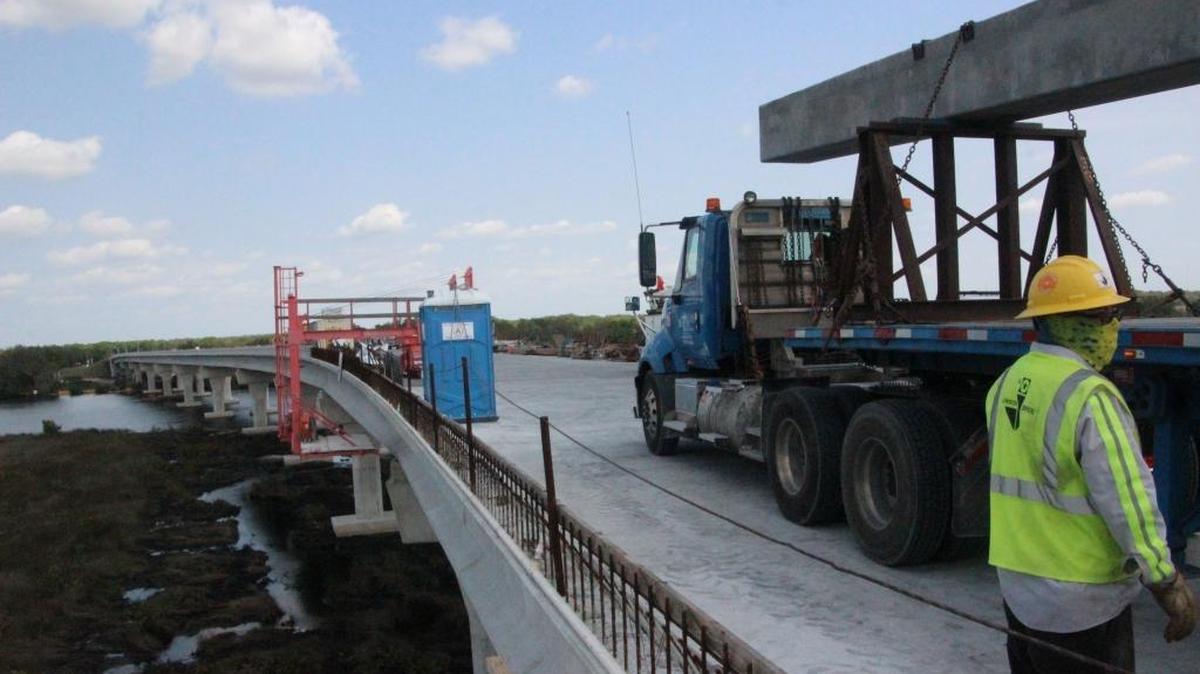 Construction of the Fort Hamer Bridge started on the north shore and moved south across the Manatee River. This photo taken in March showed the construction was nearing the south shore.