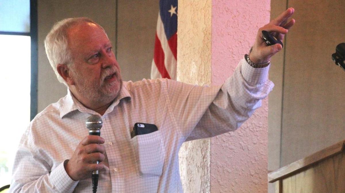 Rex Jensen, chief executive officer of Schroeder-Manatee Ranch, points to a graphic of Lakewood Ranch during a presentation to the East Manatee Republican Club Thursday at Peridia.