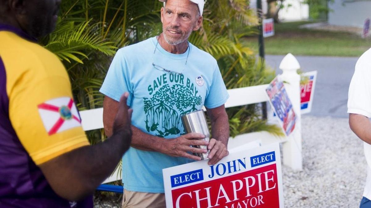 Bradenton Beach mayoral candidate John Chappie greets voters outside of the polling location on Tuesday evening in Bradenton Beach.
