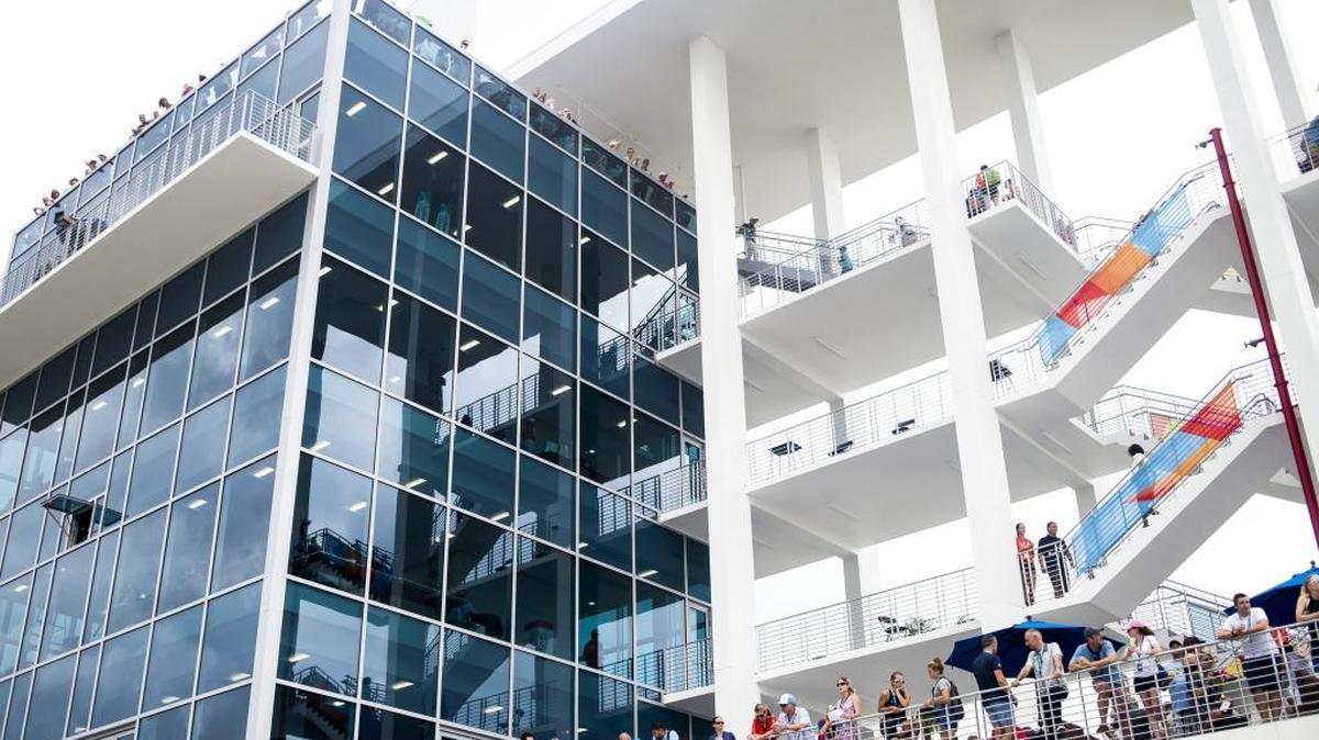 Fans lean on the railing of the VIP section of the Finish Tower of the World Rowing Championships during the Sept. 30 finals at Nathan Benderson Park in Sarasota.