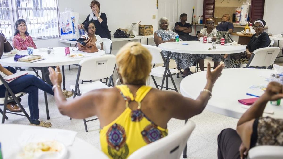 Washington Park residents voice their grievances with the neighborhood as they gather for their first official neighborhood meeting on Tuesday evening at the St. Stephens AME Church in Bradenton.