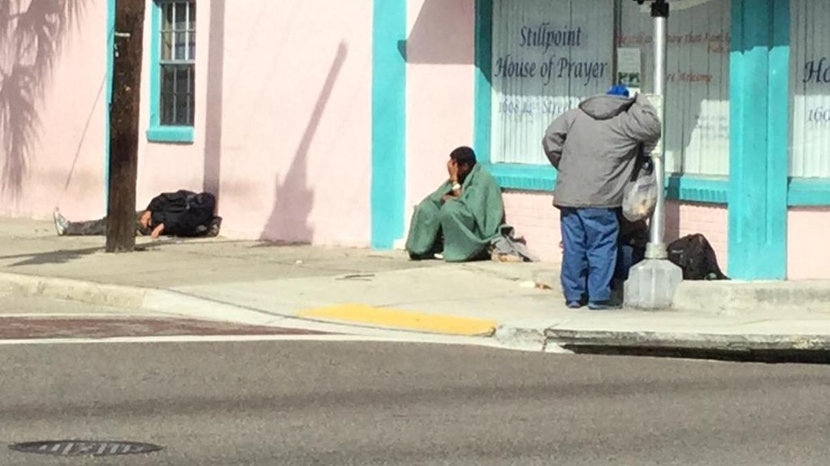 Homeless people gather on a street corner in the 1600 block of 14th Street West in Bradenton in 2016. On Monday, volunteers will take the 2018 annual homeless census.