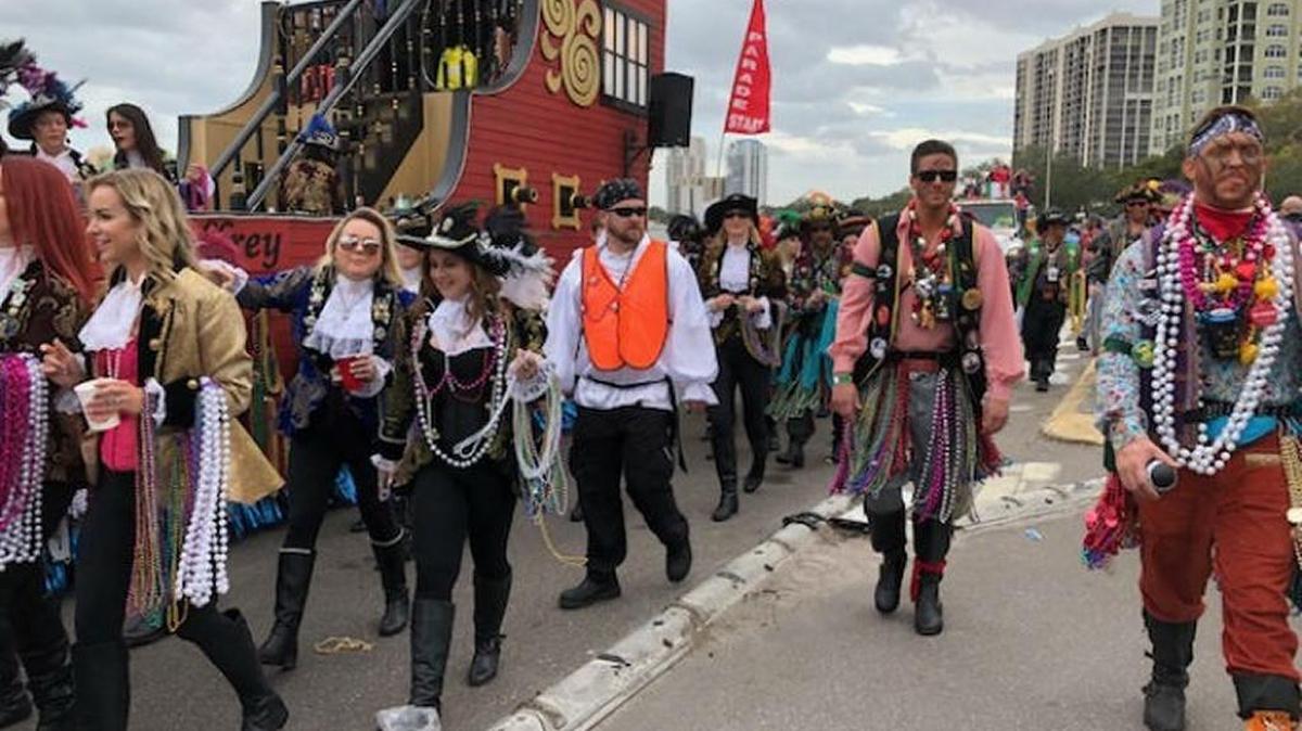 Pirates march down the streets of Tampa for the Gasparilla Parade of Pirates on Saturday.