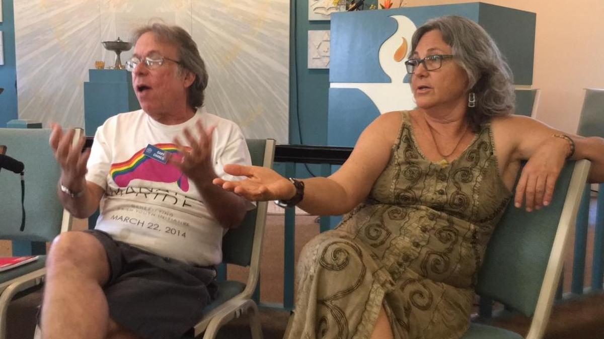 Gary Chanco, left, and Lisa Bohn, discuss last Sunday’s shooting in Orlando at Manatee Unitarian Universalist Fellowship in Bradenton on Sunday.