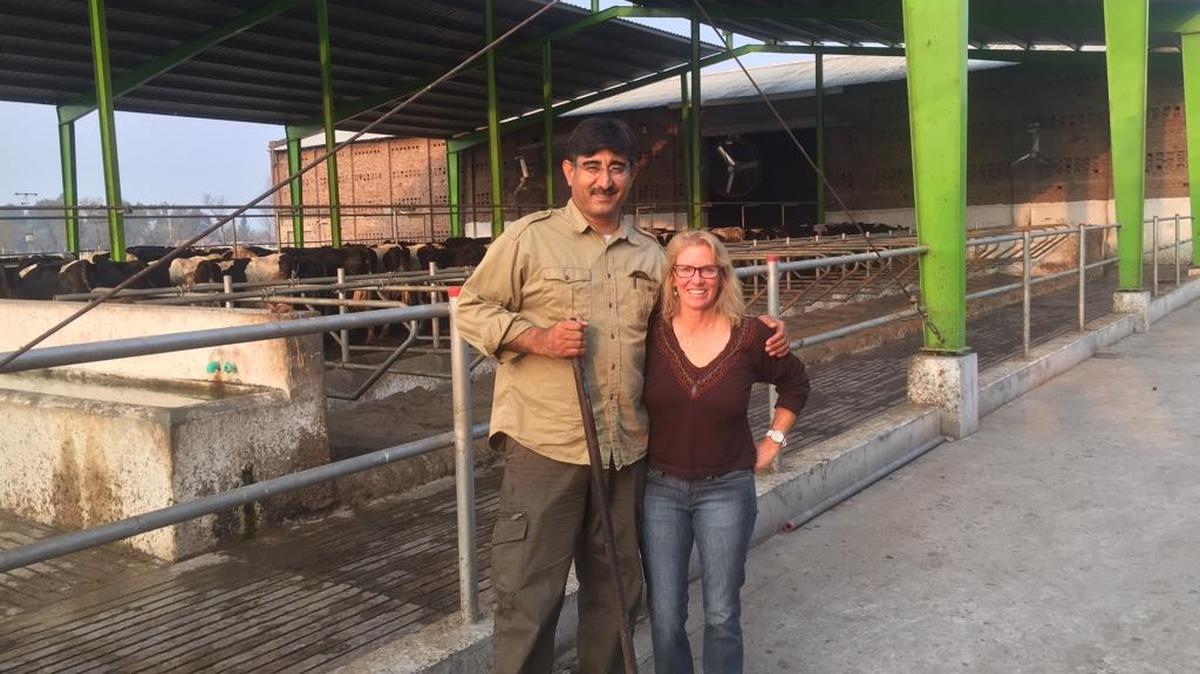 Renee Strickland is shown with her partner Usman Ali at a Pakistani dairy.