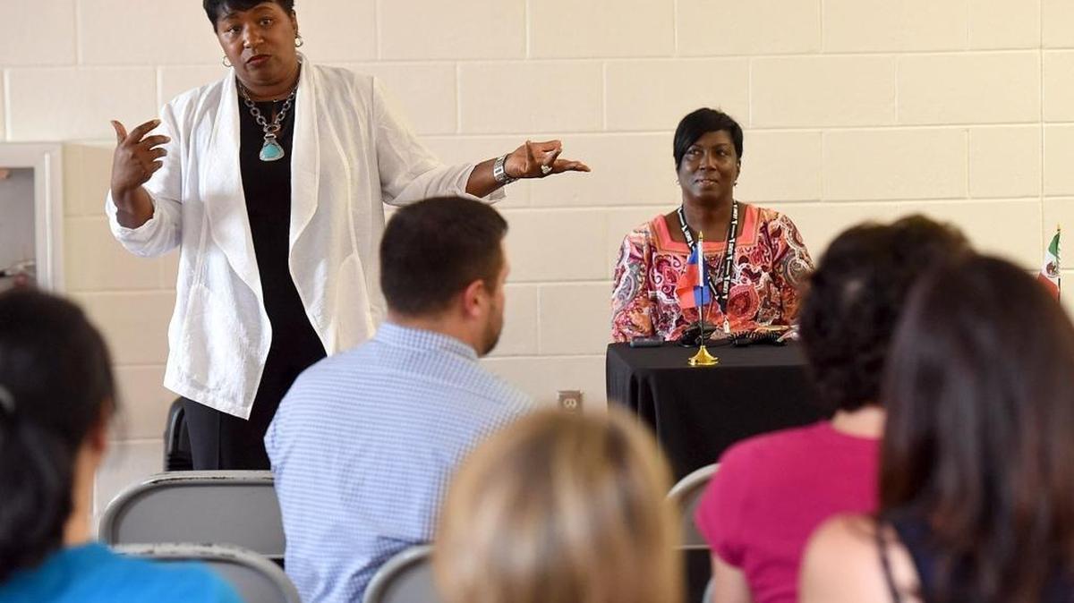 In this file photo, Diana Greene speaks to the crowd at a meeting she hosted at Johnson Middle School. Greene said the tentative 2016-17 budget brings stabilization to the district.