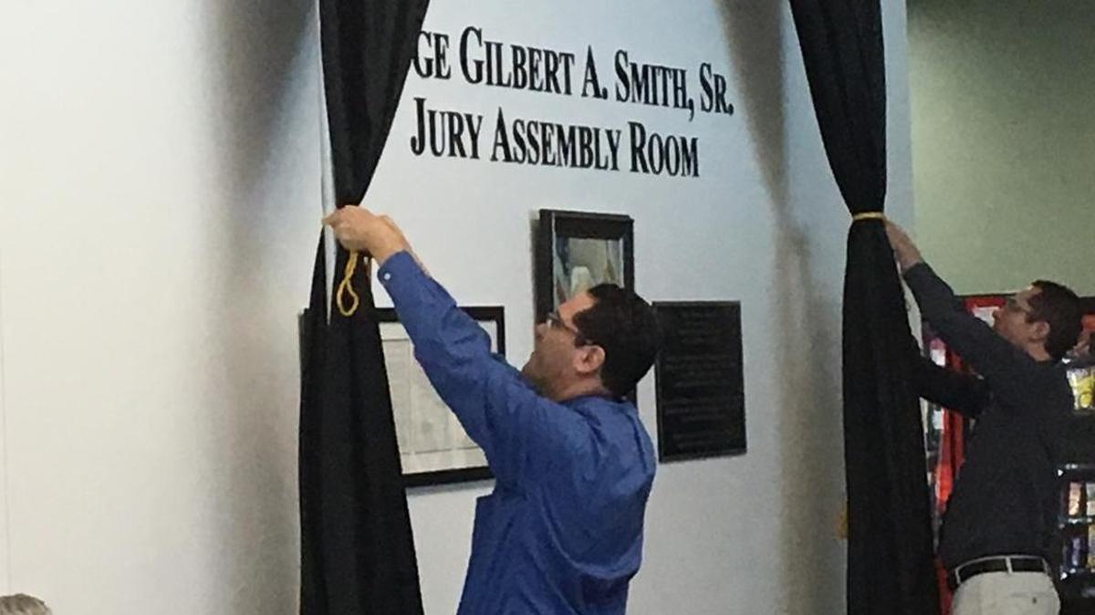 On Friday, the Judge Gilbert A. Smith Sr. Jury Assembly Room was officially dedicated, including the unveiling of this memorial on a wall in the assembly room.