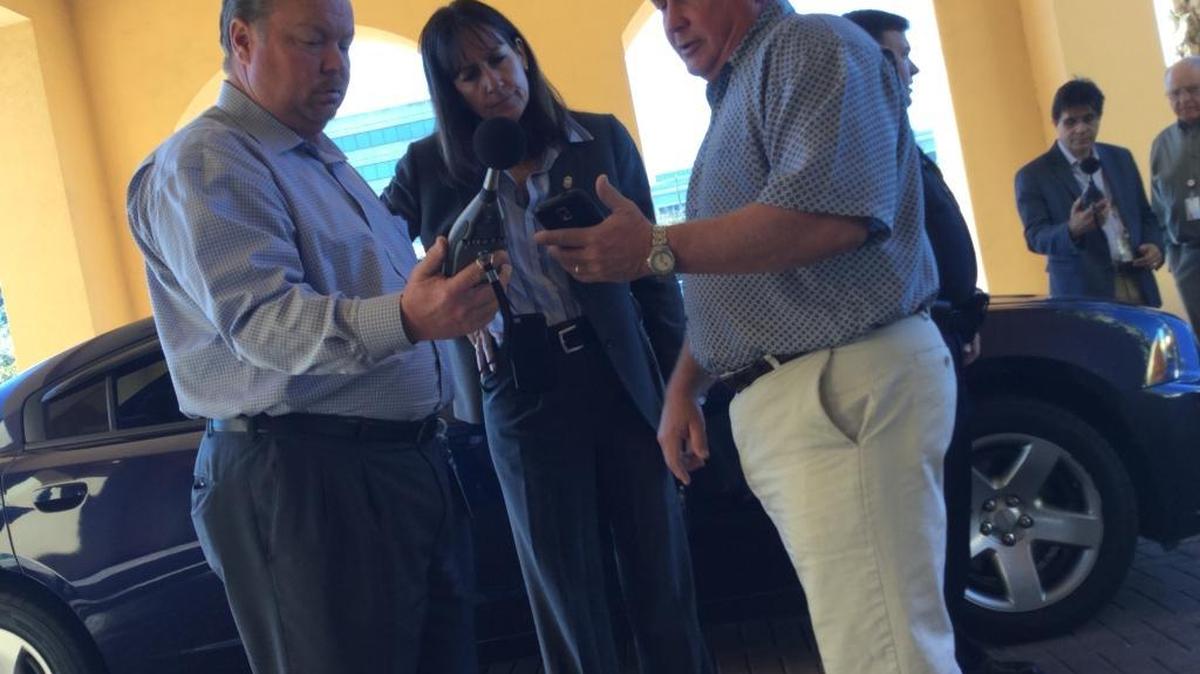 Councilman Gene Brown, Police Chief Melanie Bevan and Councilman Bemis Smith review decibel readings during a demonstration on Wednesday as officials look to push forward a new noise ordinance.