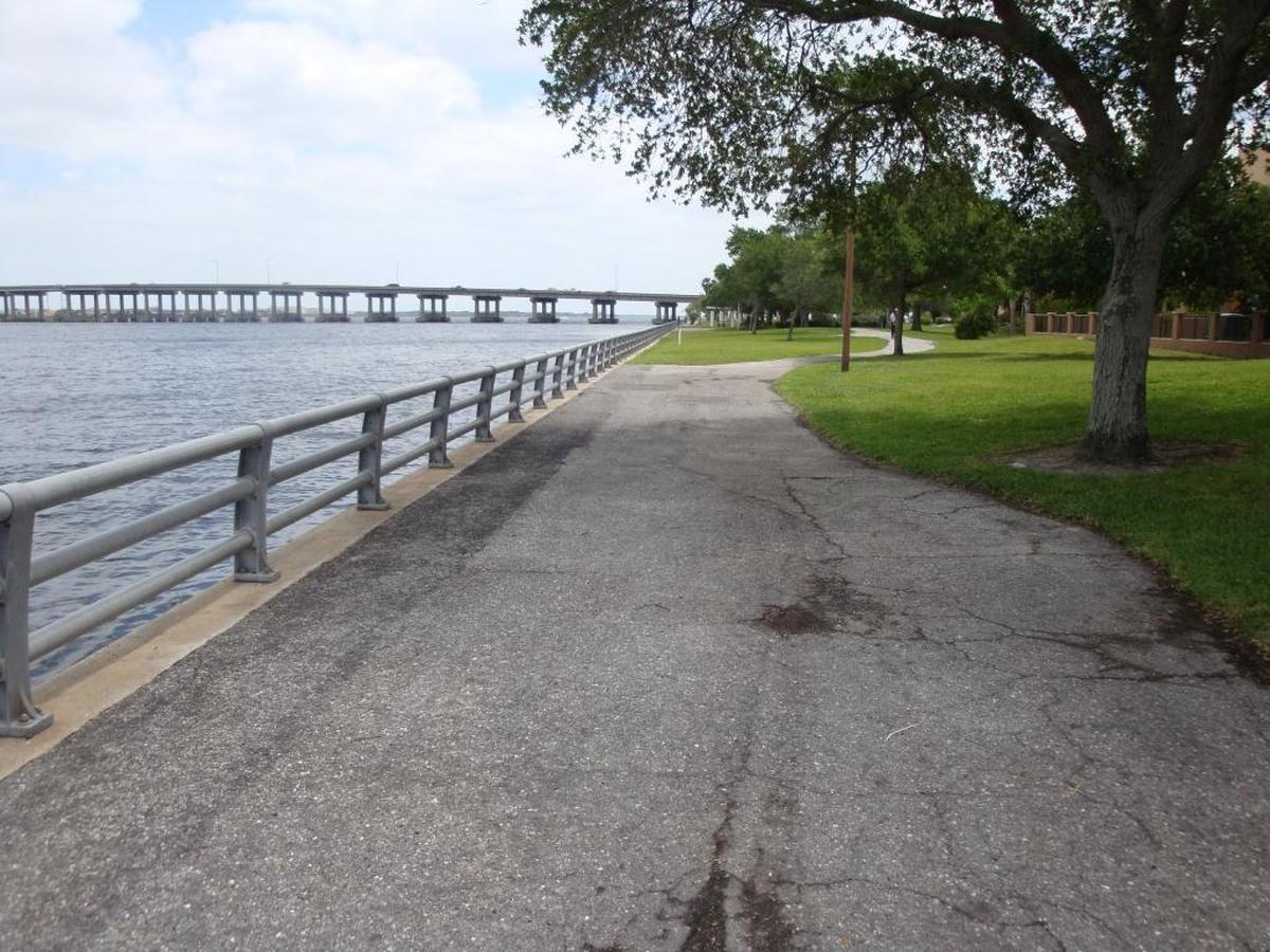 What the “living room” area of the current Riverwalk looked like before it was built and how Riverside Drive East can improve with the planned expansion.