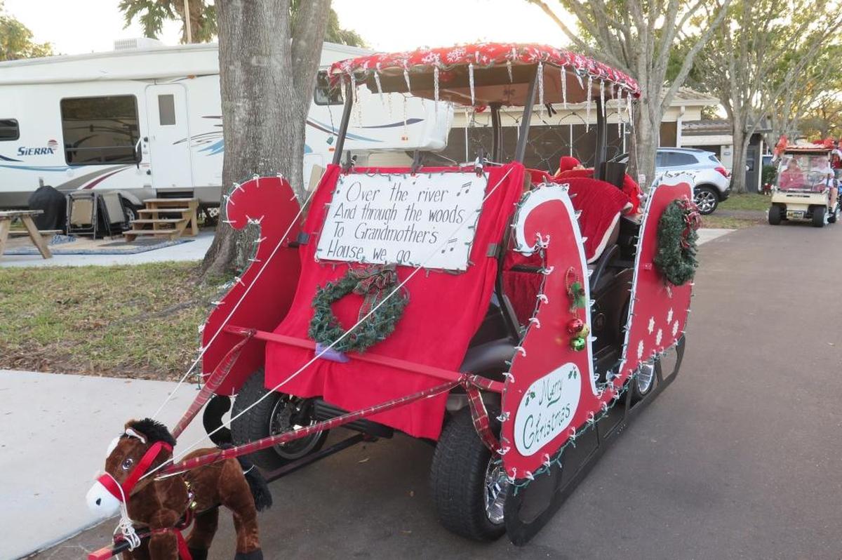 Residents at Horseshoe Cove RV Resort deck out their golf carts in the 19th Annual Golf Cart Parade on Monday, Dec. 18.