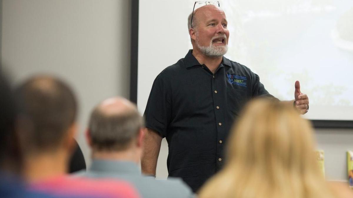 Dr. Victor Harris teaches a SMART Couples class at the University of Florida in July. Manatee County is one of six counties in the state to offer the free class to residents.