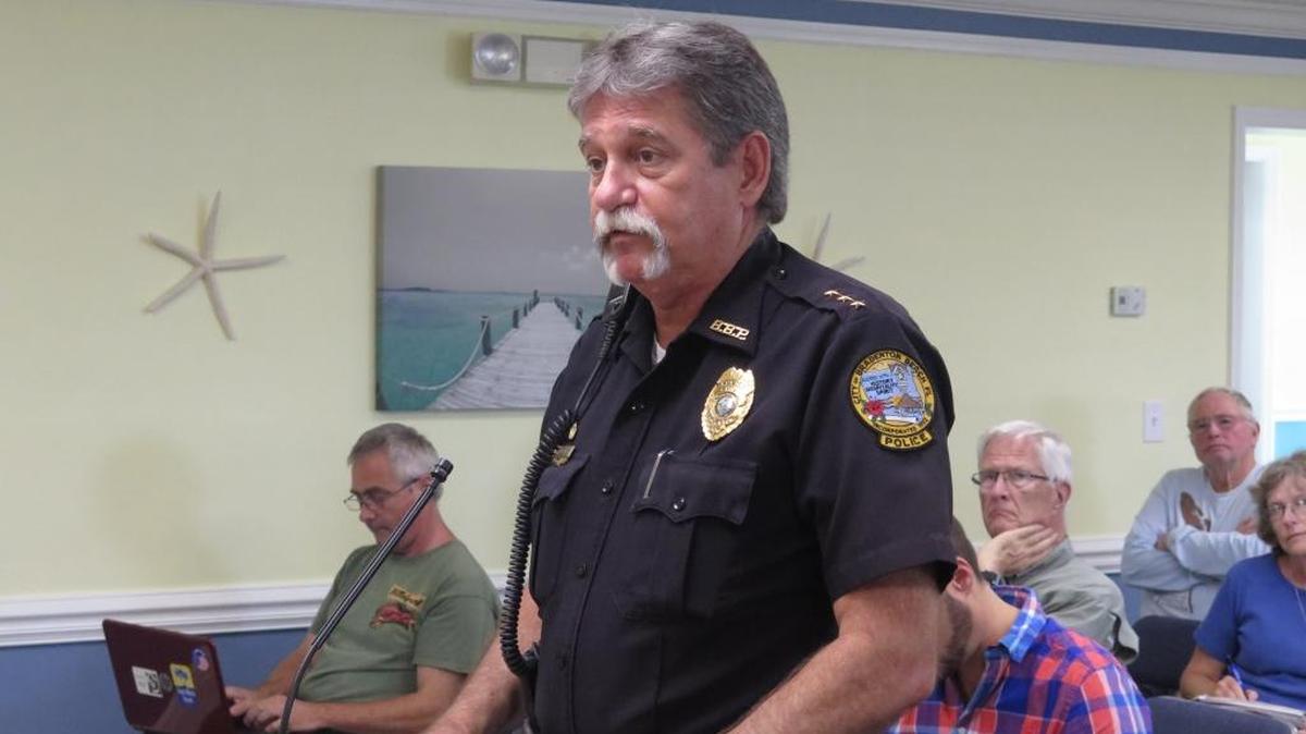 Bradenton Beach Police Chief Sam Speciale speaks to the Bradenton Beach Commission Thursday about repairs to a floating day dock parallel to the Historic Bridge Street Pier.
