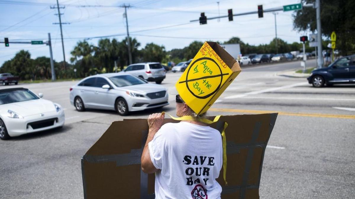 Activists gathered on the corner of Cortez Road and 75th Street West to protest the proposed Aqua By The Bay development on Saturday afternoon in Bradenton. The Manatee County Planning Commission recommended denial of the proposed Carlos Beruff housing development during Thursday’s meeting.