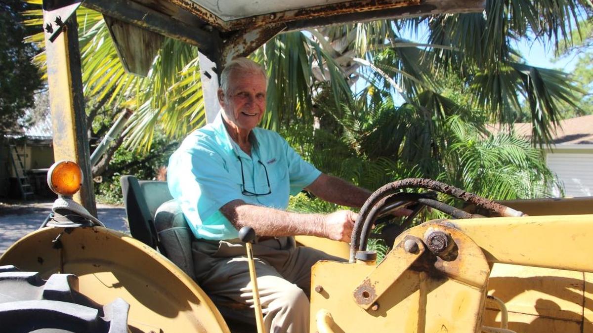Retired Army Col. Charlie Jones, now nearly 89 years old, still does many good deeds in his neighborhood in Northwest Bradenton. His wife of 67 years says he is never happier than when he is on his tractor.