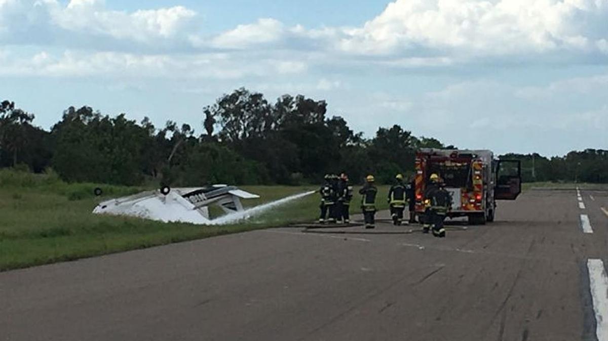 Two people were injured when a small aircraft and a helicopter collided at Clearwater Airpark, authorities said.