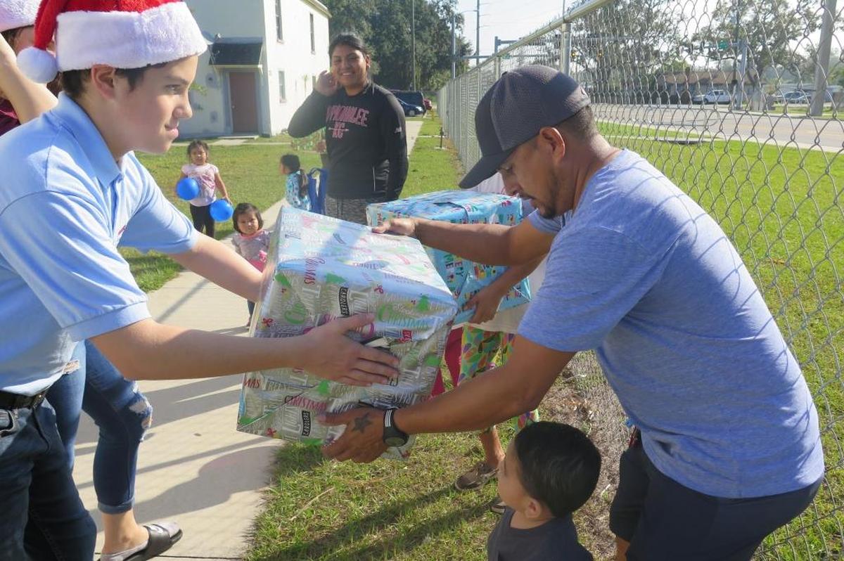 Students from Electa Lee Middle School spent the beginning of their Christmas break delivering presents to children, families and the homeless for the second annual Blessing Baskets event on Friday, Dec. 22.