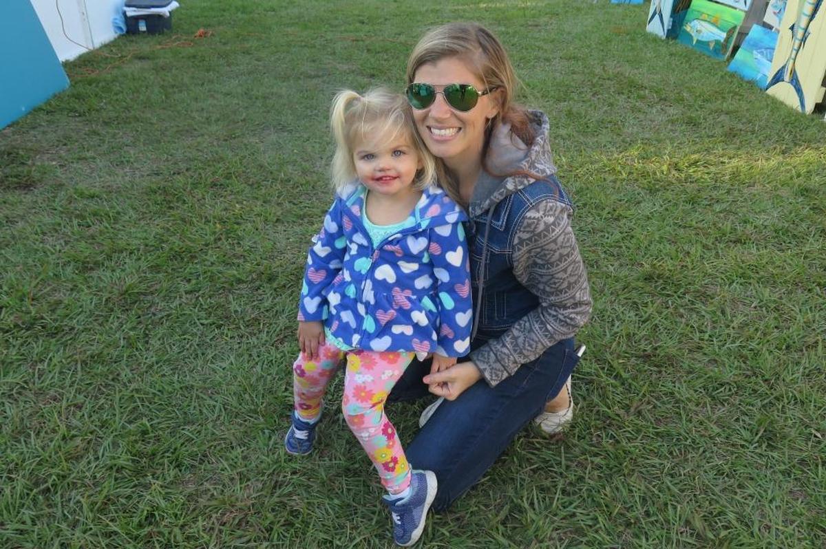 Two-year-old Darci Dennis got to explore the annual Heintz & Becker De Soto Seafood Fest for the first time with her mother, Tiffany, on Friday, March 23, 2018.
