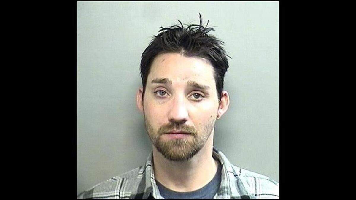 Arlington police said 31-year-old Blake Austin Cowan is accused of killing an 18-year-old woman as she backed out of the driveway of a home in early November.