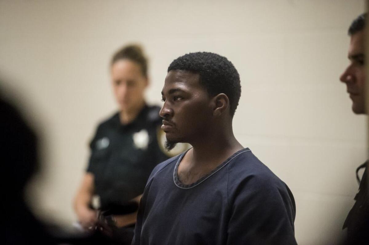 Darryl Hanna Jr., charged with the murders of Zota Beach Resort employees, security guard Kevin Carter, 51, of Bradenton and night front desk manager Timothy Hurley, 59, appears on camera in front of the judge on Thursday afternoon at the Manatee County Jail in Palmetto.