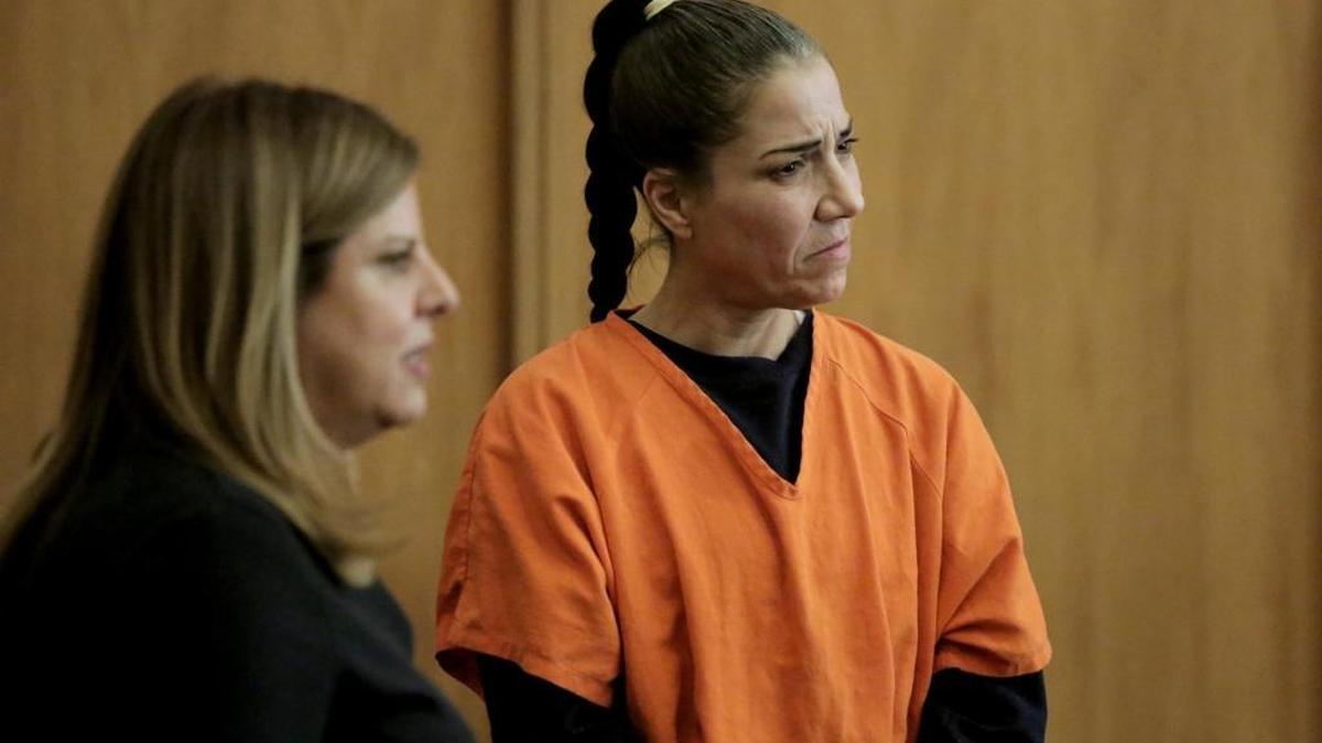 Marilyn Aguilera and her attorney Ana M. Davide listen to Judge Diane Ward during the proceedings on January 19, 2017.