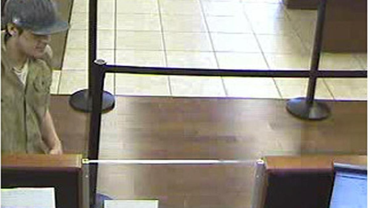 The suspect investigators believe to be the “Shaky Bandit” approaching a teller window at a Port St. Lucie Chase Bank Monday.
