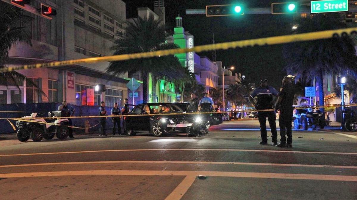 A Miami Beach police officer was rushed to the hospital after being hit by a car. Police say there was also a shooting victim at the scene.